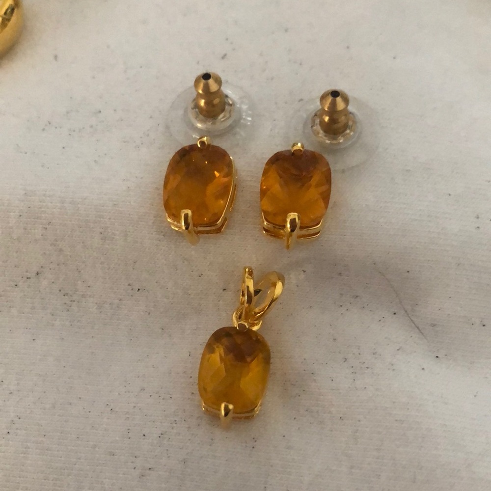 Joan Rivers yellow sapphire Pendant and earrings